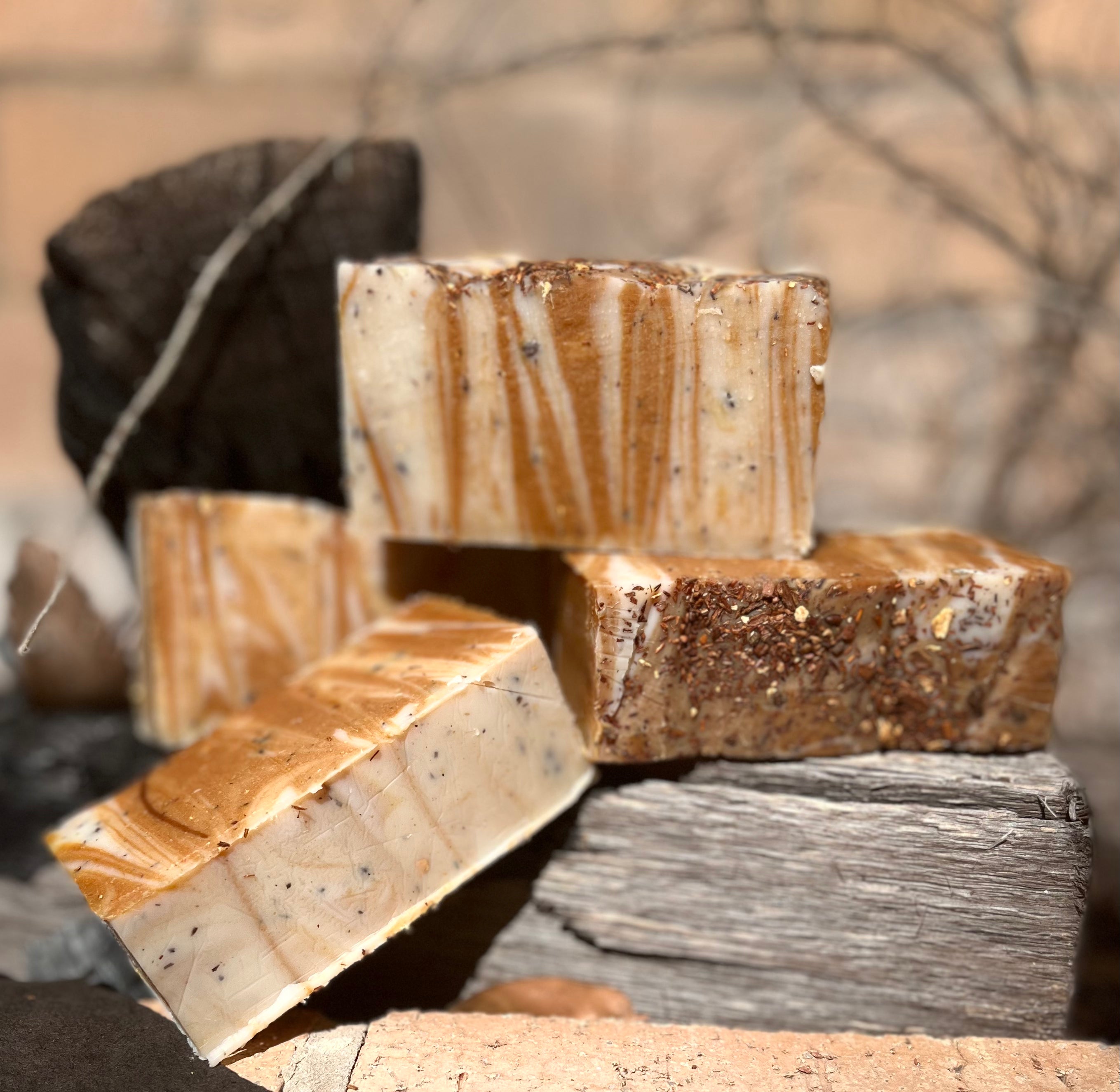 CAMPFIRE AND FIRFLIES ORGANIC HANDMADE SOAP WILL TAKE YOU BACK TO SITTING AROUND THE CAMPFIRE ON A COOL FALL EVENING. LOADED WITH CHAI TEA IN AND SPRINKLED ON TOP ADDS TO ITS BEAUTY